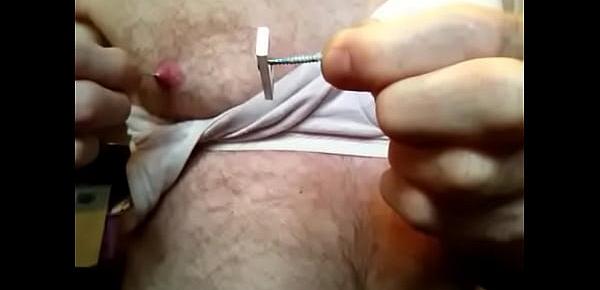  Screws being power driven into nipples